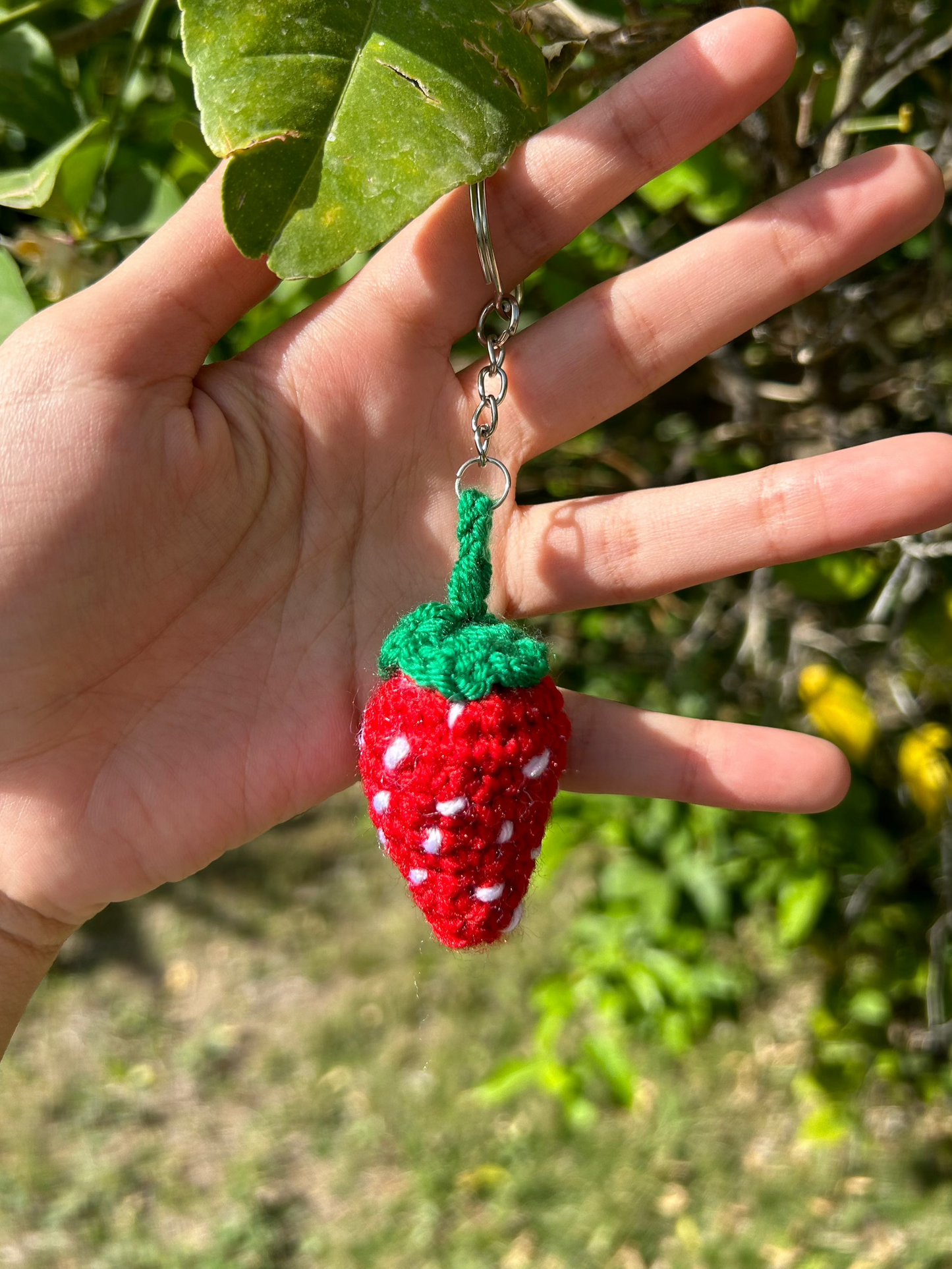 Crochet strawberry charm
